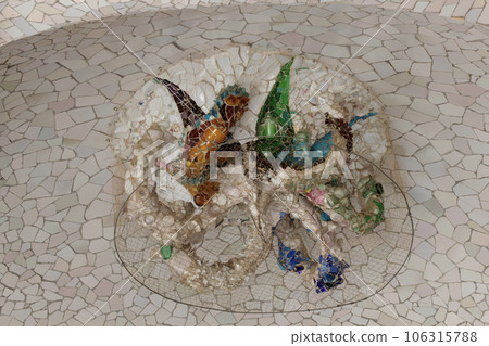 Mosaic Sun Ceiling Artistry in Park Guell by Antonio Gaudi Mosaic Sun Ceiling Artistry in Park Guell by Antonio Gaudi 106315788