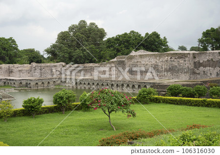 Ruins near Kapur Talao, situated in the fort opposite Jahaz Mahal, built by Sultan Ghiyasuddin Khilji, Mandu, Madhya Pradesh, India 106316030