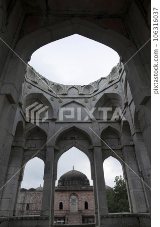 Ruins and pillars of marble tomb of Asharfi Mahal or The Madarsa, built by Hoshang Shah around 14th century, located in Mandu, Madhya Pradesh, India Ruins and pillars of marble tomb of Asharfi Mahal or The Madarsa, built by Hoshang Shah around 14th century, located in Mandu, Madhya Pradesh, India 106316037