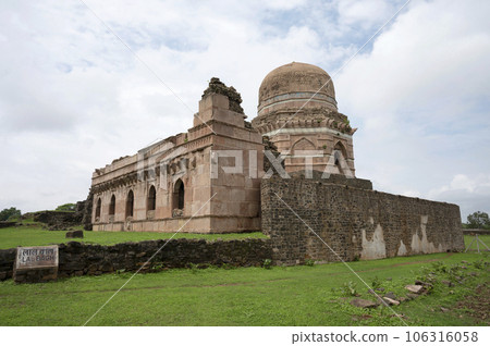 Dai Ki Chhoti Bahan Ka Mahal, a tomb of a lady, octagonal on plan, crowned by a shapely dome built in Red chisseled masonry with four arched openings facing the four cardinal points, located in Mandu, 106316058