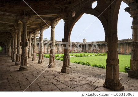 Carved pillars inside the Malik Mughith's Mosque, built A.D. 1452,  belongs to the first phase of Mulsim architecture in Malwa, Mandu, Madhya Pradesh, India 106316065