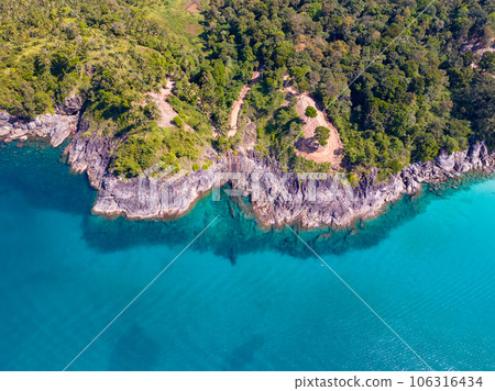 Aerial view seashore with mountains at Phuket Thailand, Beautiful seacoast view at open sea in summer season, Nature recovered Environment and Travel background 106316434