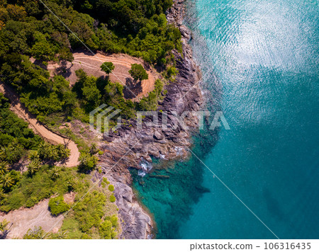 Aerial view seashore with mountains at Phuket Thailand, Beautiful seacoast view at open sea in summer season, Nature recovered Environment and Travel background 106316435