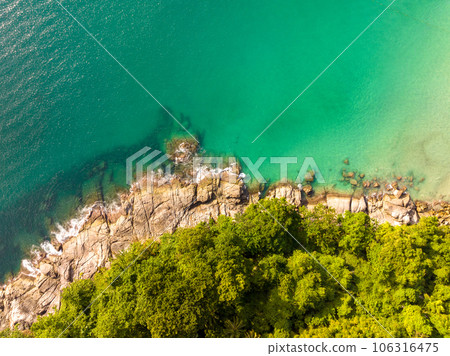 Aerial view seashore with mountains at Phuket Thailand, Beautiful seacoast view at open sea in summer season, Nature recovered Environment and Travel background 106316475