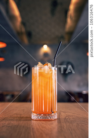 Cold and refreshing orange and lemon cocktail Cold and refreshing orange and lemon cocktail 106316476