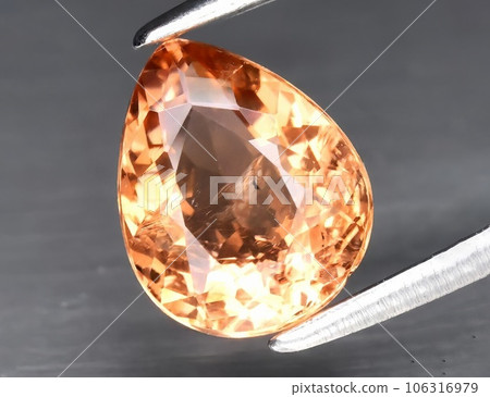 Natural gem pink tourmaline on gray background 106316979