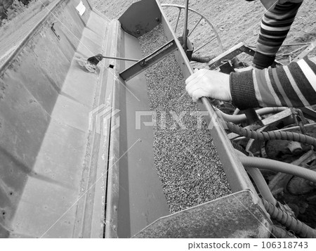 Plowed field by tractor in black soil on open countryside nature 106318743