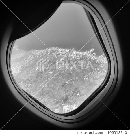 Beautiful view from airplane window, large wing of aircraft shows casement 106318840