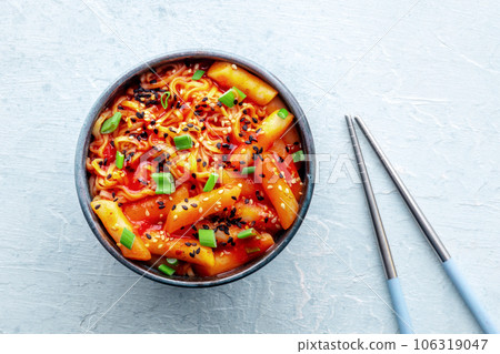 Rabokki, tteokbokki or topokki with ramen, Korean street food, spicy rice cakes Rabokki, tteokbokki or topokki with ramen, Korean street food, spicy rice cakes 106319047