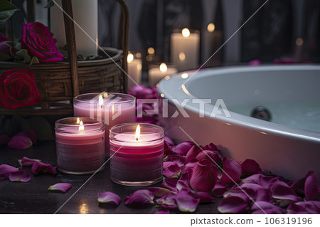 Romantic atmosphere. Burning scented candles and rose petals. 106319196