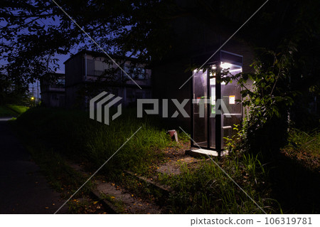 Telephone box in an abandoned housing estate 106319781