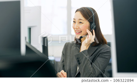 Female operator working in the office 106322894