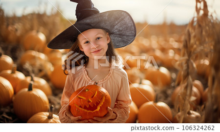 girl with orange Halloween pumpkins in the field girl with orange Halloween pumpkins in the field 106324262