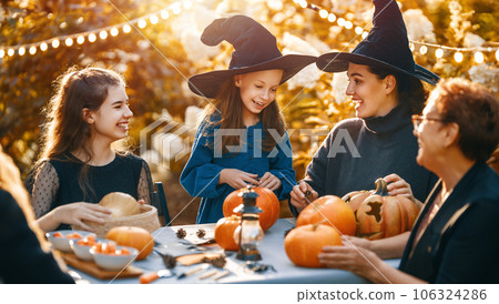 family preparing for Halloween 106324286