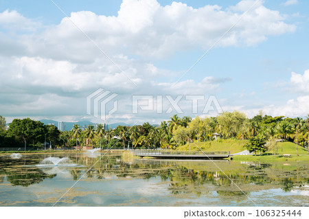 Taman Tasik Titiwangsa park, lake and palm tree in Kuala Lumpur, Malaysia Taman Tasik Titiwangsa park, lake and palm tree in Kuala Lumpur, Malaysia 106325444