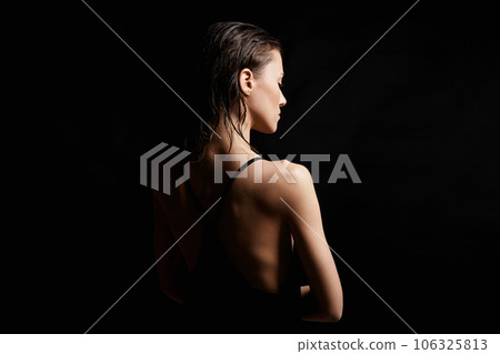 Beautiful sexy model Girl in black Dress. Female Back Beautiful sexy model Girl in black Dress. Female Back 106325813
