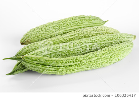 Bitter gourd on a white background board. Bitter gourd on a white background board. 106326417