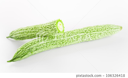 Bitter gourd on a white background board. Bitter gourd on a white background board. 106326418