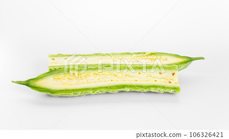 Bitter gourd on a white background board. Bitter gourd on a white background board. 106326421