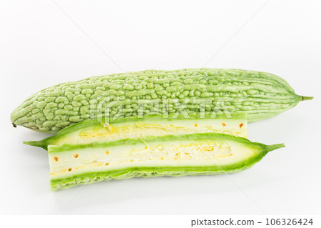 Bitter gourd on a white background board. Bitter gourd on a white background board. 106326424