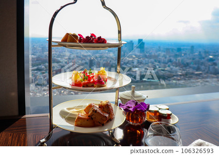 Luxury hotel Ritz-Carlton Tokyo top floor lounge afternoon tea Luxury hotel Ritz-Carlton Tokyo top floor lounge afternoon tea 106326593