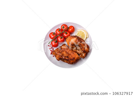 Delicious fried sea bass fish in the form of slices with spices and herbs Delicious fried sea bass fish in the form of slices with spices and herbs 106327917