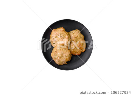 Delicious fried chopped fillet pancakes with spices, salt and herbs 106327924