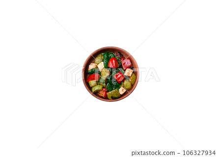 Delicious fresh salad of zucchini, cheese, sweet peppers, spinach with spices and herbs Delicious fresh salad of zucchini, cheese, sweet peppers, spinach with spices and herbs 106327934