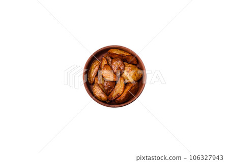 Delicious grilled potato slices with garlic, spices and herbs 106327943