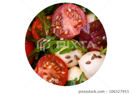 Delicious fresh salad with mozzarella cheese, cherry tomatoes, herbs, salt and spices 106327953