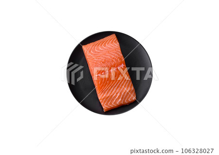 Fresh raw salmon red fish fillet with salt and spices Fresh raw salmon red fish fillet with salt and spices 106328027