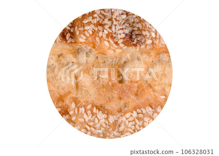 Crispy wheat flour baguette with sesame seeds on a wooden cutting board 106328031