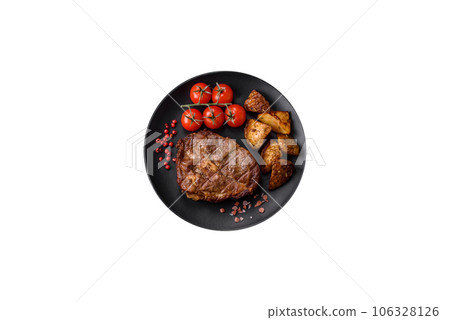 Delicious juicy pork or beef steak grilled with salt, spices and herbs 106328126