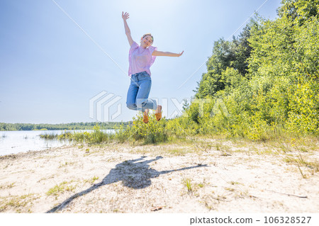 Elevated Joy: Leaping into Summer Bliss 106328527