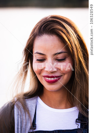 Beautiful asian young woman smile and cheerful. Confident cute female looking down, away from camera 106328549