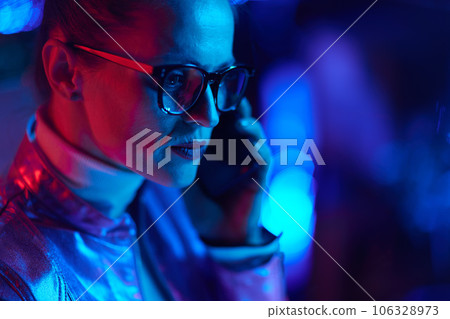 trendy woman in glasses talking on smartphone 106328973