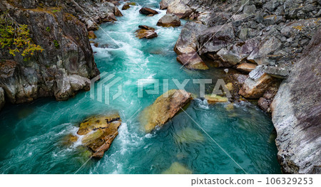 River in a Rocky Mountain Canyon. British Columbia, Canada. Aerial Nature Background 106329253
