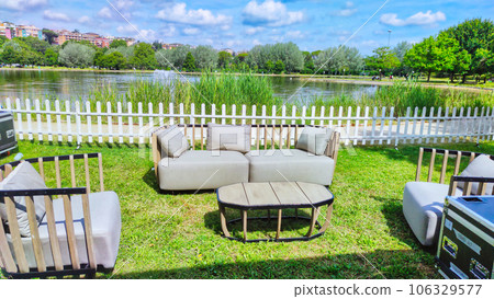 garden furniture near the pond 106329577
