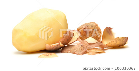peeled raw potatoes close-up, the object is isolated on a white background 106330362