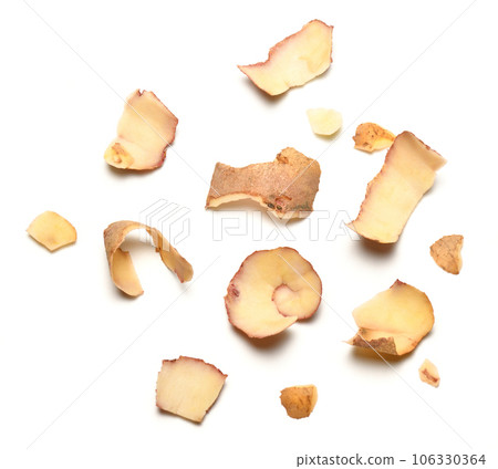 raw potato peel close-up, group of objects are isolated on a white background 106330364