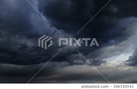 storm sky, dark dramatic clouds during thunderstorm, rain and wind, extreme weather, abstract background storm sky, dark dramatic clouds during thunderstorm, rain and wind, extreme weather, abstract background 106330542