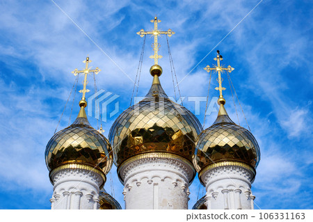 Golden domes of the Russian Orthodox Church against the blue sky Golden domes of the Russian Orthodox Church against the blue sky 106331163