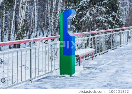 Auto machine check in railway tickets on the platform. 106331832
