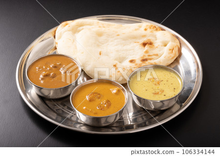 South Indian curry and naan (mutton keema brown masala brown moily) South Indian curry and naan (mutton keema brown masala brown moily) 106334144