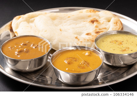 South Indian curry and naan (mutton keema brown masala brown moily) South Indian curry and naan (mutton keema brown masala brown moily) 106334146