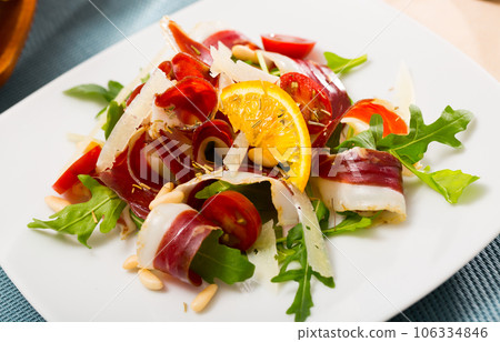 Salad with dried duck breast Magret 106334846