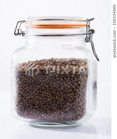 Glass bottle of dry lentils Glass bottle of dry lentils 106334984