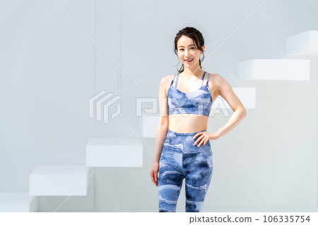 Young woman in fitness wear Young woman in fitness wear 106335754