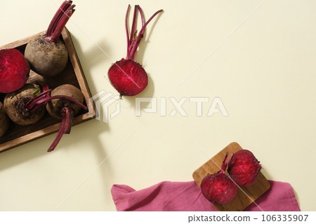 Fresh beetroot are decorated over pastel background with a towel in pink color. Using Beetroot (Beta vulgaris) for a healthy scalp and hair growth 106335907