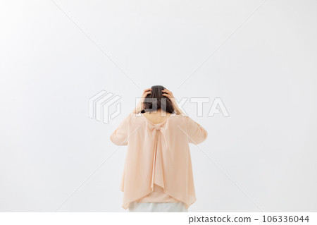 Female back view worried shock Female back view worried shock 106336044